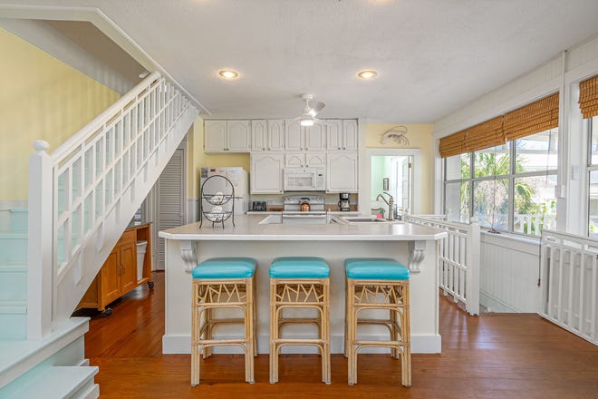 Experience the timeless allure of Tybee Island at 4 18th Terrace. Located on a double lot, this charming cottage, steeped in history since 1938 and modernized in 1995. Listed by Taavo Roos, Seabolt Real Estate.