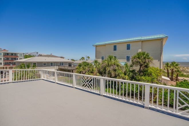 Experience the timeless allure of Tybee Island at 4 18th Terrace. Located on a double lot, this charming cottage, steeped in history since 1938 and modernized in 1995. Listed by Taavo Roos, Seabolt Real Estate.